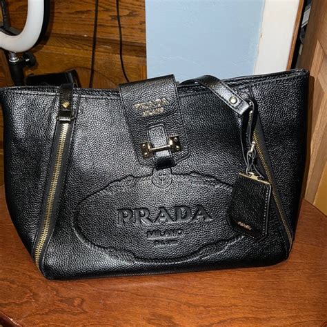 prada pebble leather wallet|leather wallet Prada price.